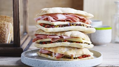 TUSCAN FLAT BREAD PRE-SLICED, muffuletta